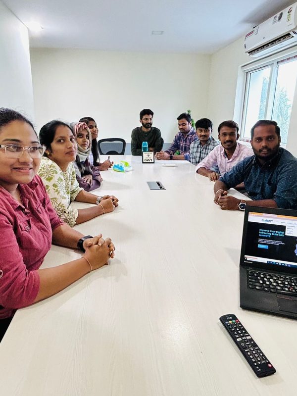 Digital marketing employees collaborating in the workplace and team leads and managers strategizing in a conference room.